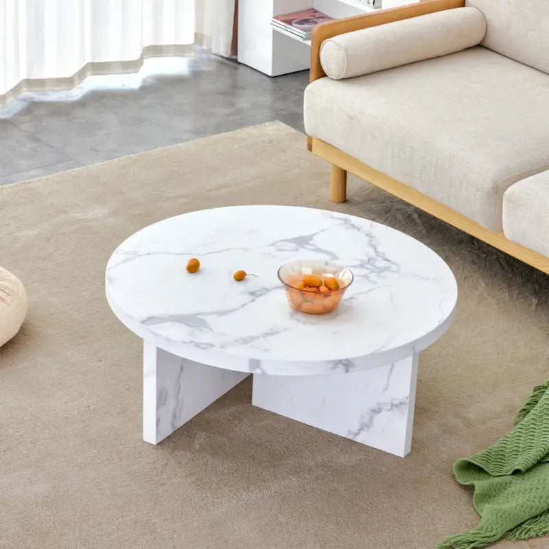 Table basse ronde en MDF blanc à motifs, idéale pour les petits espaces et les salons.